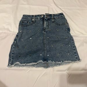 Wild Fable Jean skirt with metal polkadots on the front